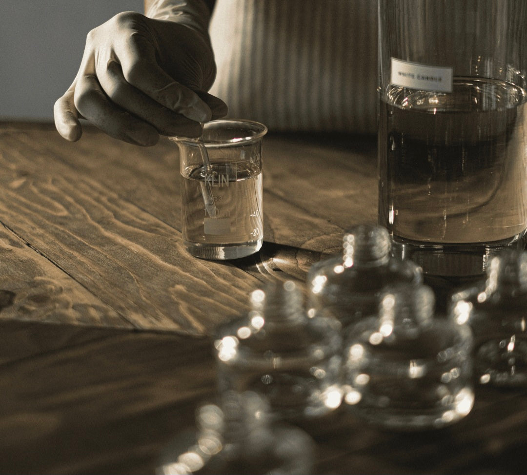 Hands blending French oil for Chez Pierre perfume